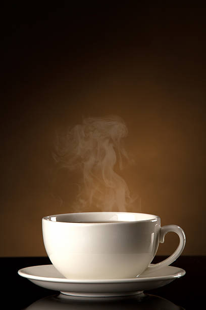 istock cup of coffee  on a brown background. 114381966