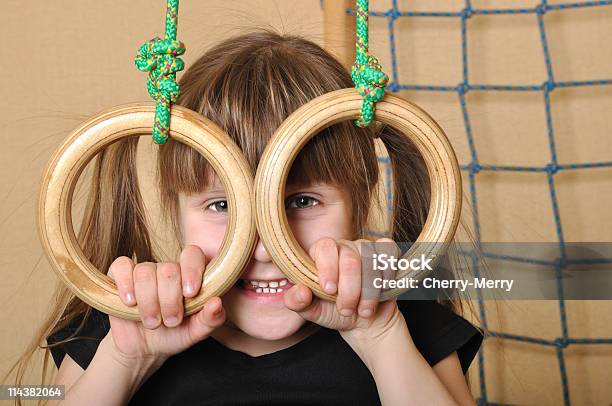 Child With Gymnastic Rings Stock Photo - Download Image Now - 6-7 Years, Active Lifestyle, Child