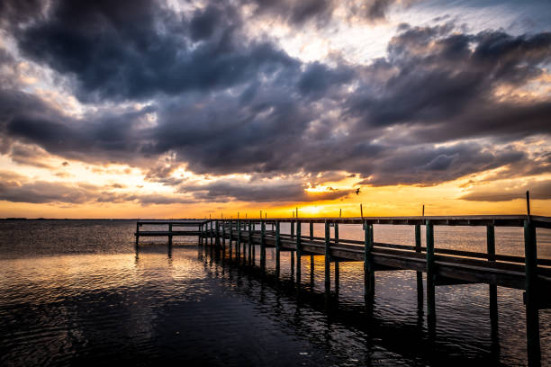 istock Wooden pier at sunset. 1143821095