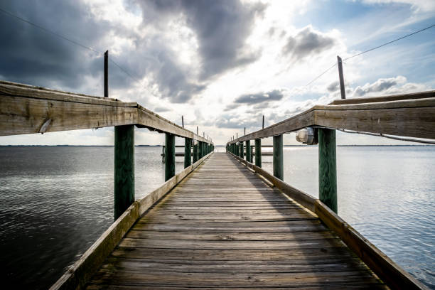istock Wooden pier at sunset. 1143821153