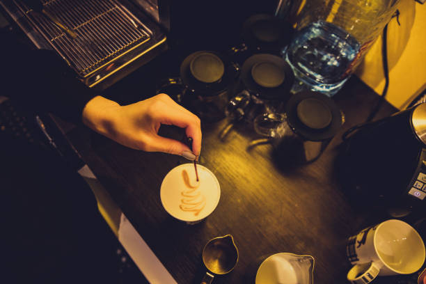 Drawing on coffee and making latte