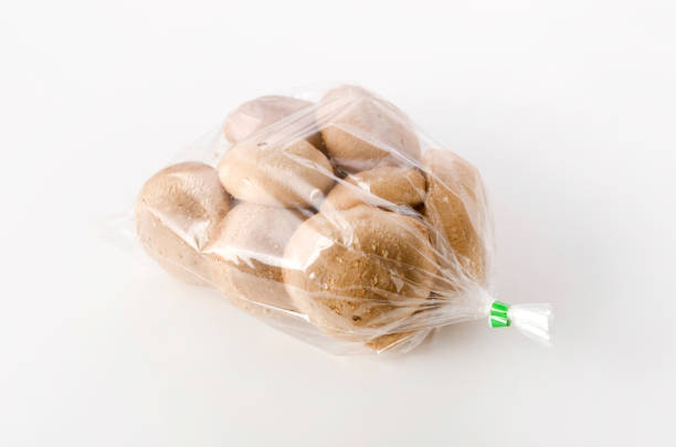 istock Shiitake mushroom in transparent plastic bag on White background 1143828376