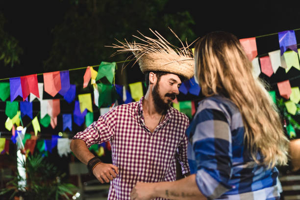 istock Couple dancing at the junin party 1143830195