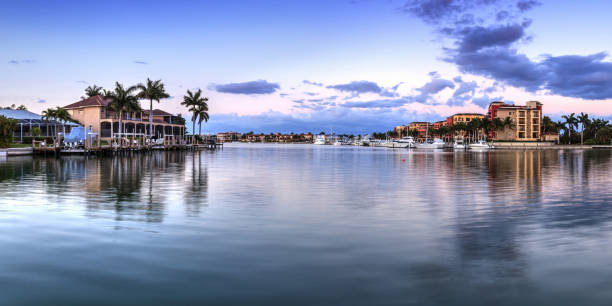 Riverway that leads to the ocean on Marco Island Riverway that leads to the ocean on Marco Island, Florida at Sunrise. marco island stock pictures, royalty-free photos & images