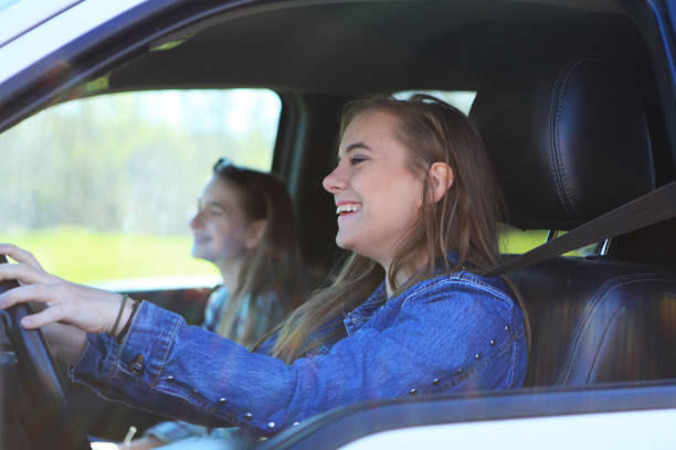 Teenage girl  driver stock photo