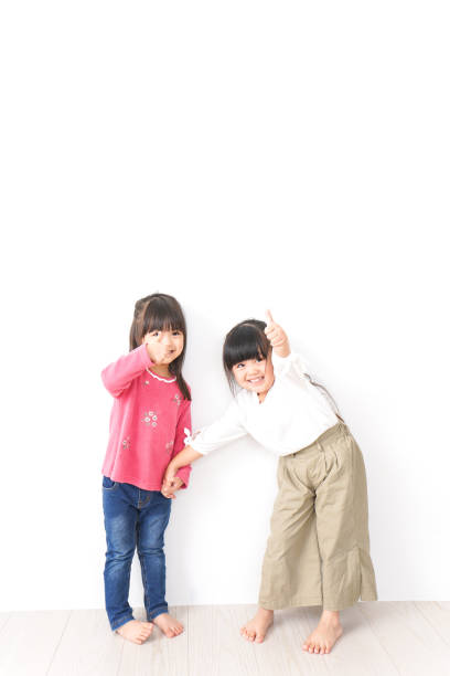 istock Girls playing with friends 1143838399