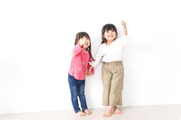 istock Girls playing with friends 1143838400
