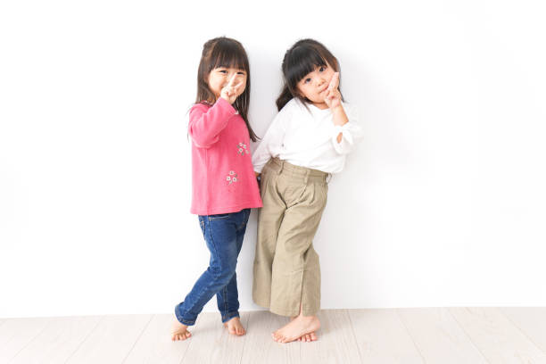 istock Girls playing with friends 1143838401