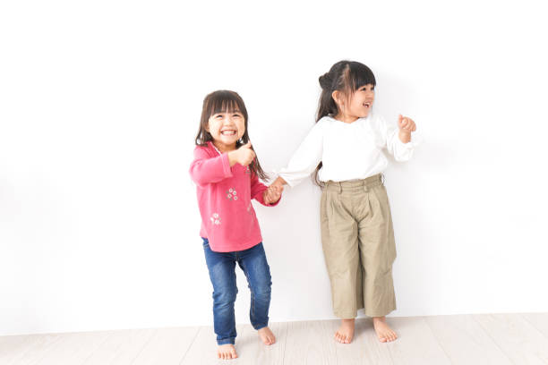 istock Girls playing with friends 1143838404