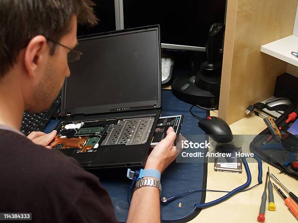 Repair Engineer Dvd Removal Stock Photo - Download Image Now - Color Image, Computer, Data