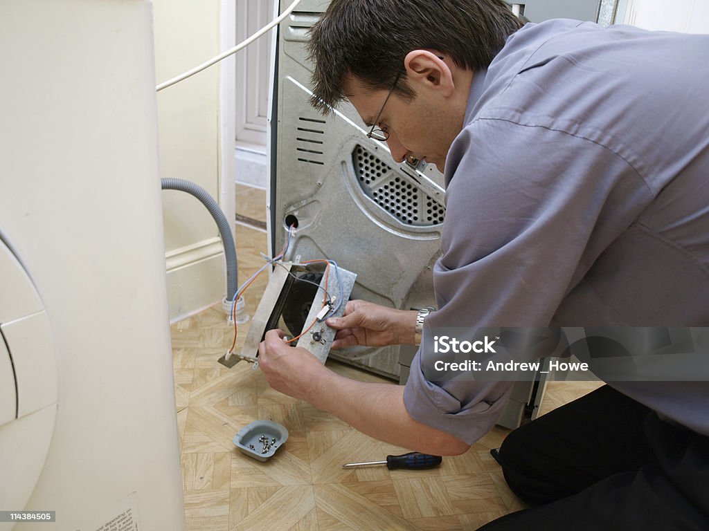 Repair man  Dryer Stock Photo