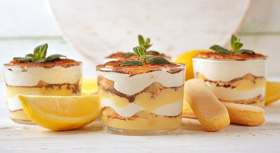 Lemon tiramisu dessert on white background