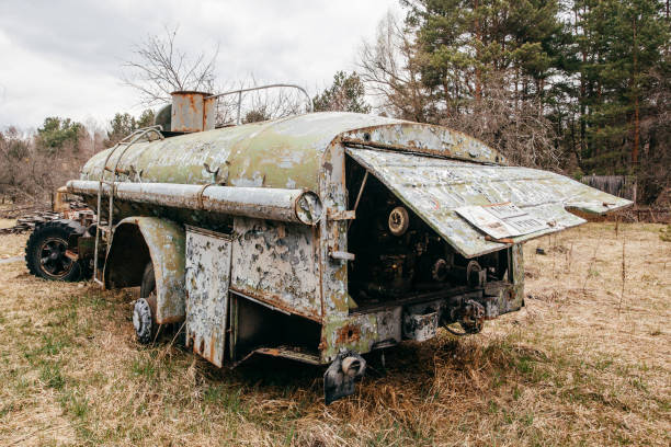 istock Old rusty abandoned Soviet fire truck in Chernobyl exclusion zone. 1143853760