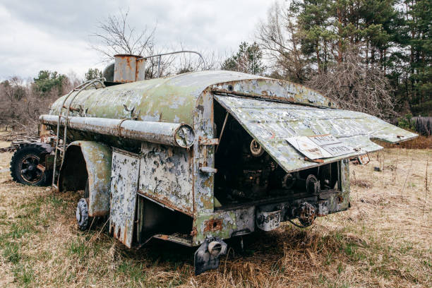 istock Old rusty abandoned Soviet fire truck in Chernobyl exclusion zone. 1143854007