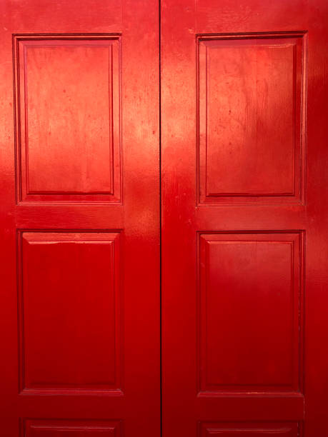 istock red wooden door abstract background and texture 1143854565
