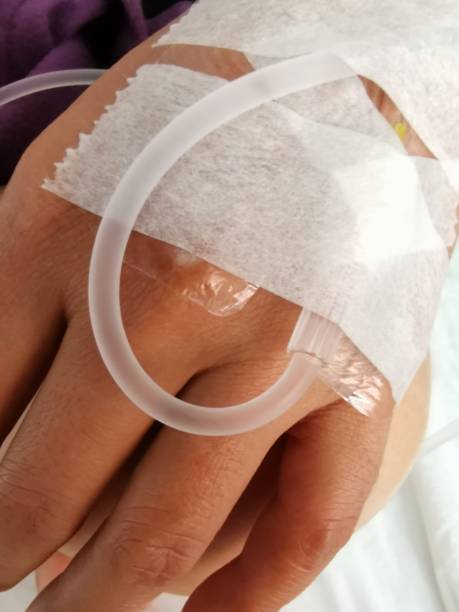 istock Patient hand with the tube 1143857993