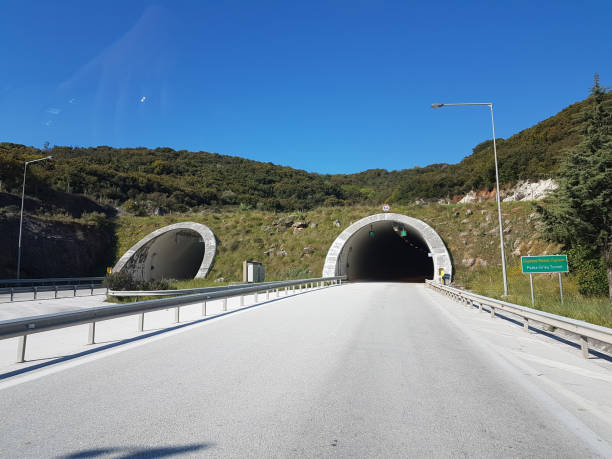 tunnel in egnatia street in modern highway between ioaannina perfecture and igoumenitsa greece - two lane highway fotos imagens e fotografias de stock
