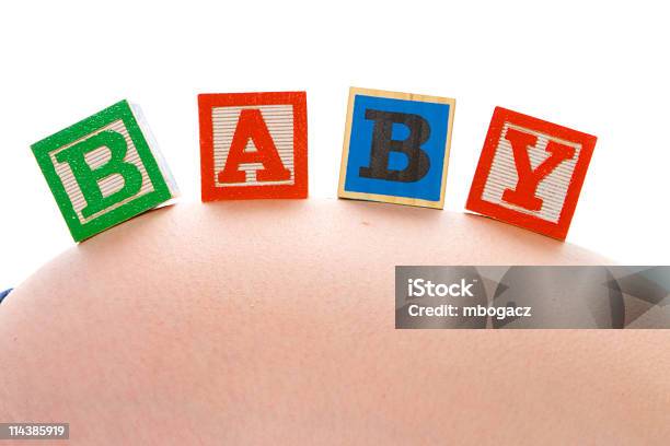 Embarazada Bebé De Texto Foto de stock y más banco de imágenes de Abdomen humano - Abdomen humano, Adulto, Adulto joven