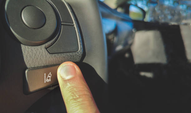 istock lane change assist system  button on the steering wheel of car 1143859232