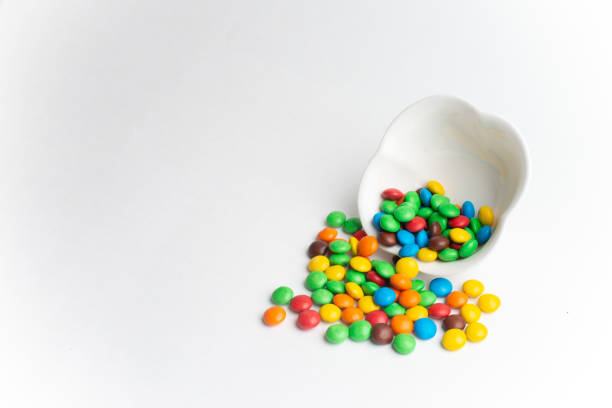 istock A bowl of multicolor chocolate candies 1143860281