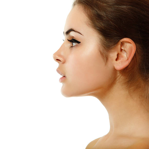 A side view shot of a beautiful young woman stock photo