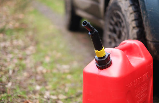 istock Gas Can on Forest Road 1143865380