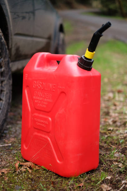 istock Gas Can on Forest Road 1143865446