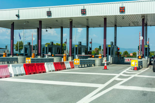 istock Empty pay toll check point - Toll booths at highway 1143868255