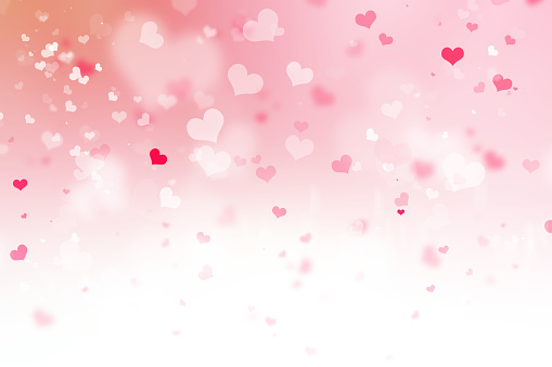 Abstract blur background. pink pastel heart love bokeh valentine's day happy concept; white sparkling rays group soft focus lens view card elements; Glowing corazones light gradient dark wallpaper.