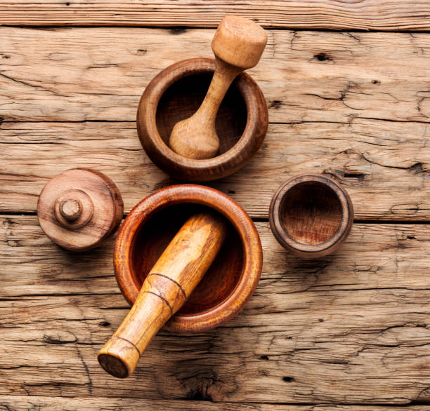 istock Wooden mortar and pestle 1143869758