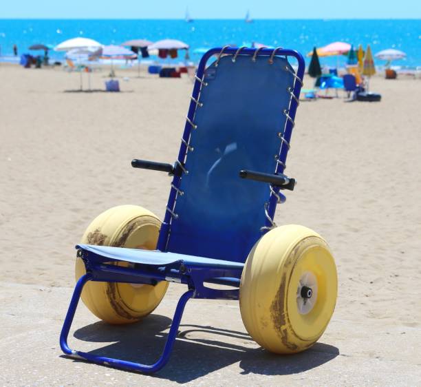 istock wheelchair with large yellow wheels 1143878335