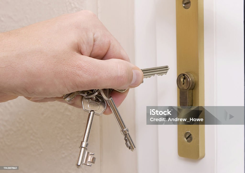 Hand with Keys  Brass Stock Photo