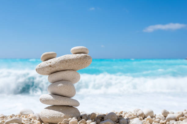 istock Balanced stones on a pebble beach 1143887951