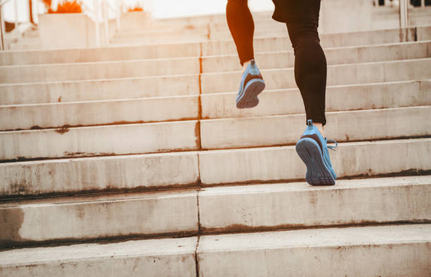 istock Young athlete running up the stairs 1143892895