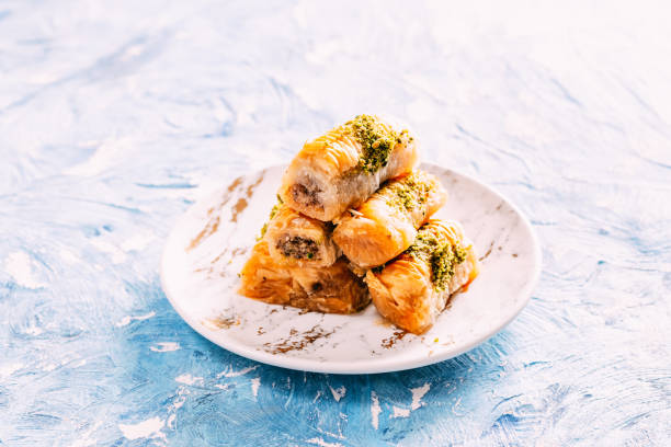 istock Delicious Dessert Baklava on Colorful Background 1143893527