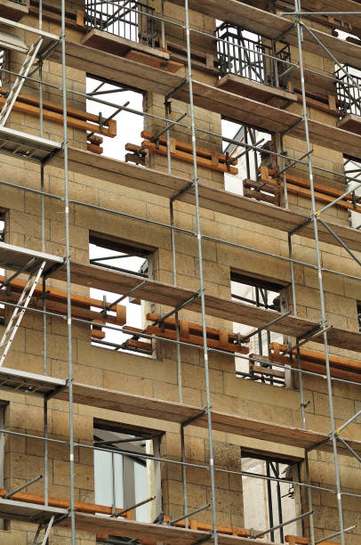 istock facade of historic building under renovation 1143895264