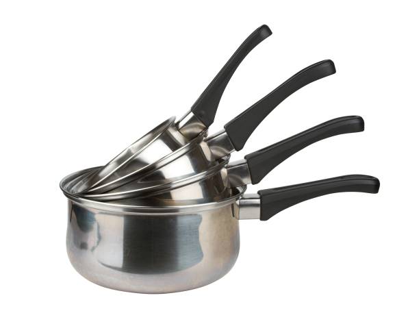 Stack of stainless steel saucepans in different sizes
