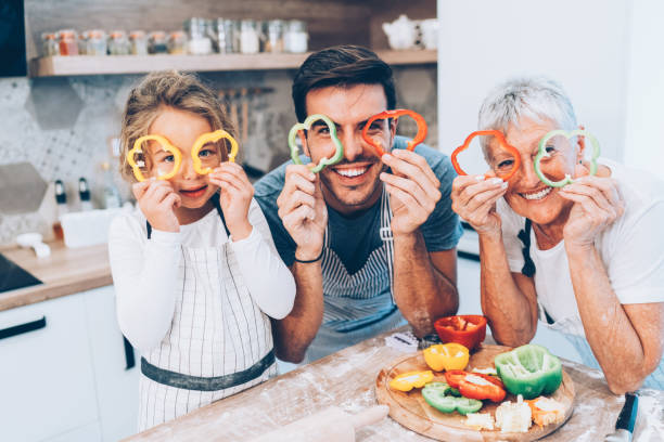 istock Happy multi-generation family in the kitchen 1143900130