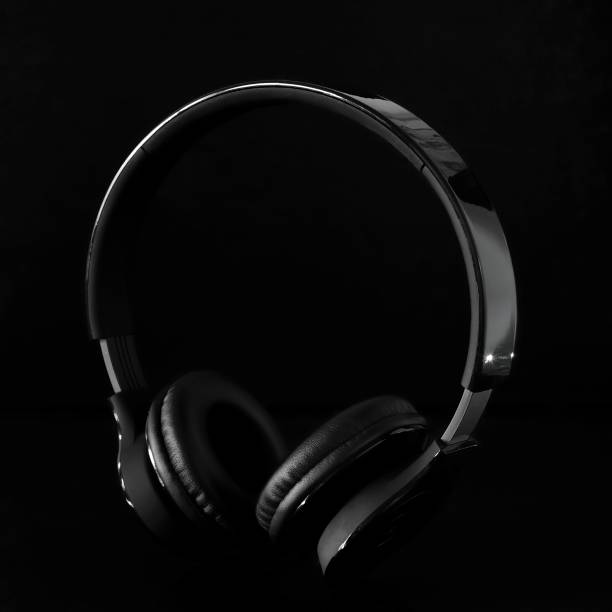 istock Headphones isolated on black 1143900378