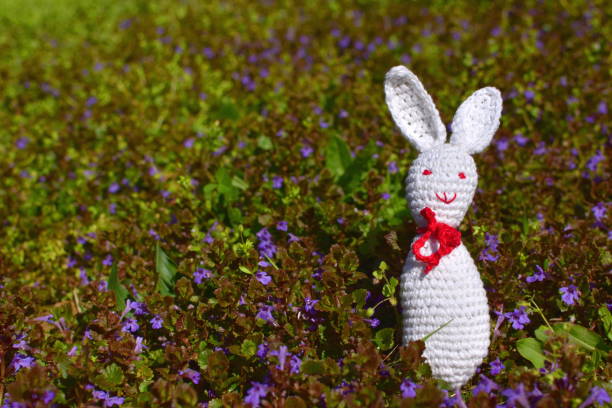 Easter rabbit on a floral background.