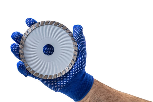 istock Circles for electric saw in male hand 1143905016