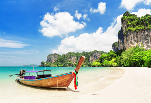 istock Thai traditional wooden longtail boat. 1143910311