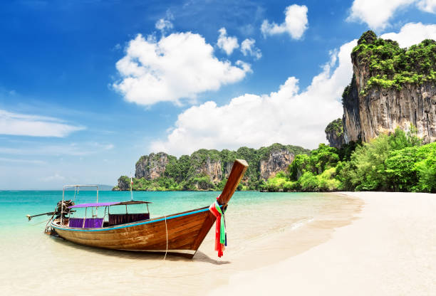 istock Thai traditional wooden longtail boat. 1143910336
