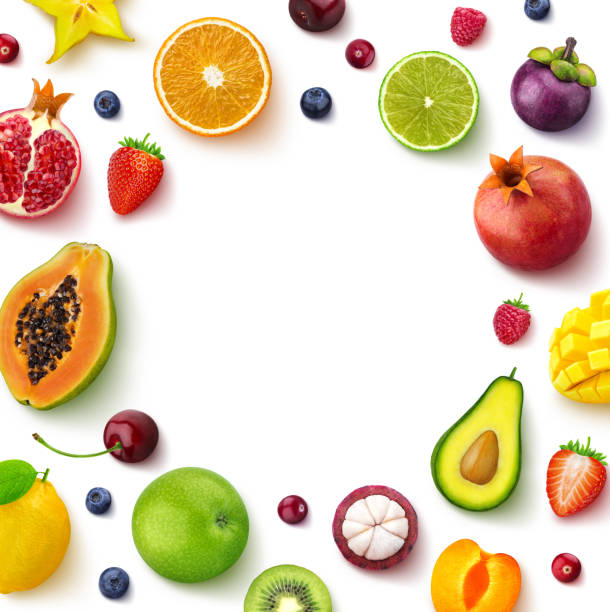 istock Various fruits and berries isolated on white background, top view, creative flat layout, round frame of fruits with empty space for text 1143911053