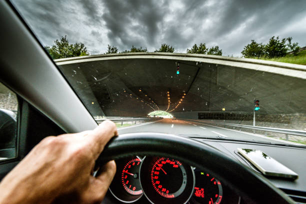 istock driving car on highway road 1143911875