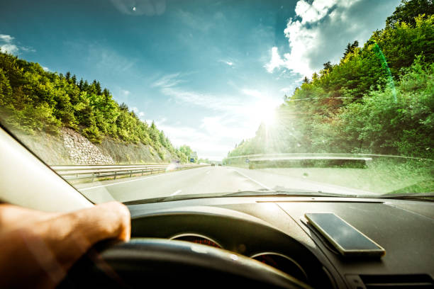 istock driving car on highway road 1143913727