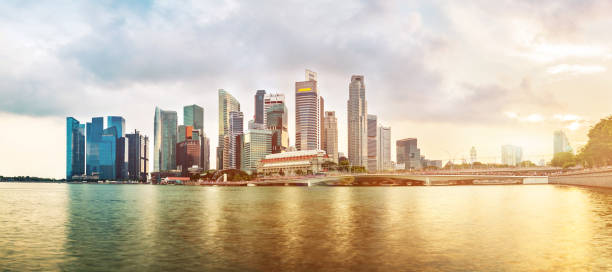 istock Singapore business district skyline during sunset. 1143917700