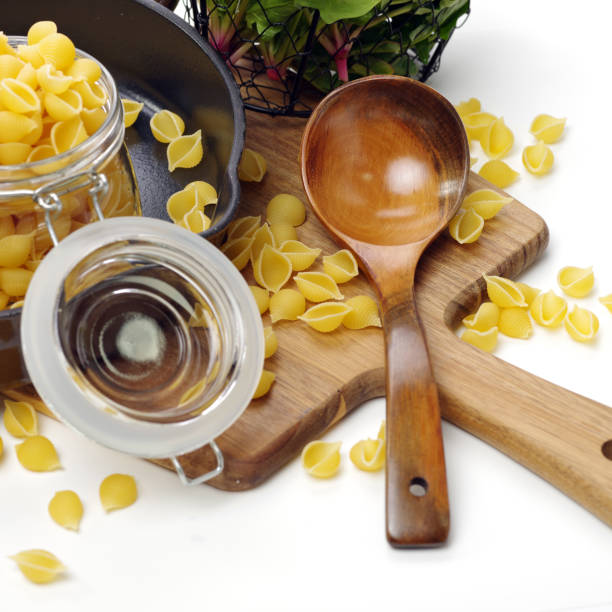 istock Italian pasta (Gomiti Rigati) on white background 1143918832