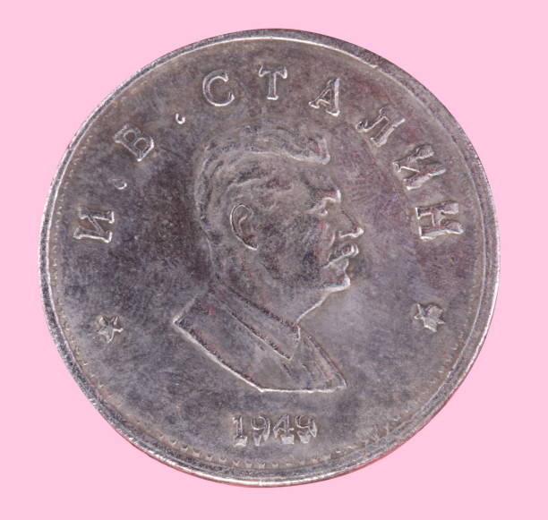 istock Russian coin 1 ruble 1949 CCCP isolated on pink 1143921805