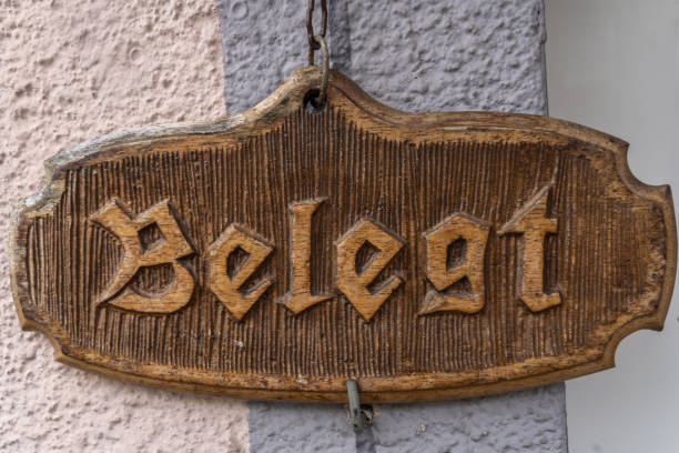istock Busy sign on a German front door (apartment occupied) 1143924145